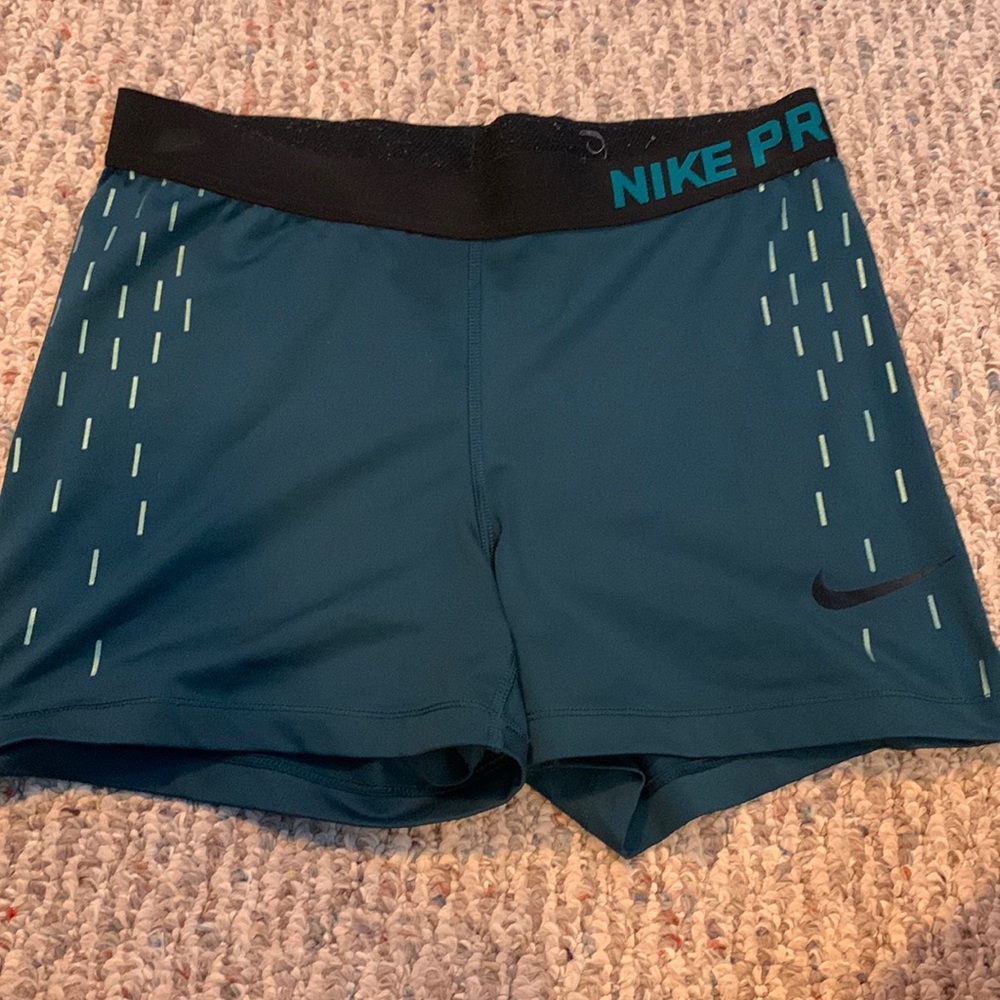 Teal Nike pros